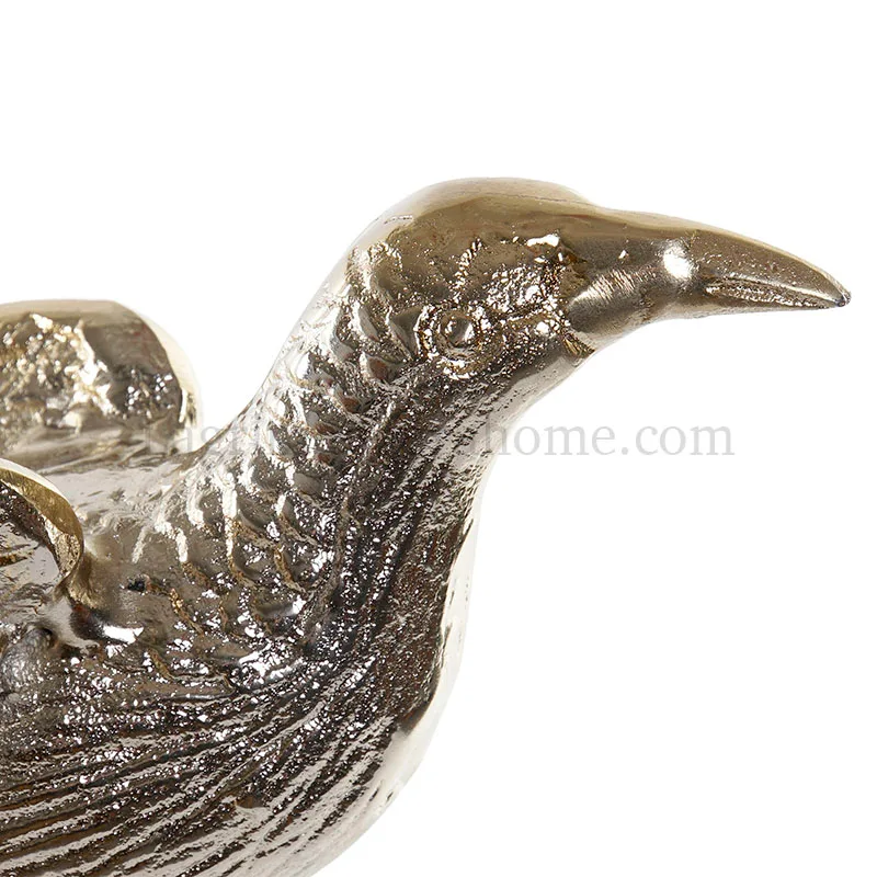 Figura aluminio garza dorada detalle